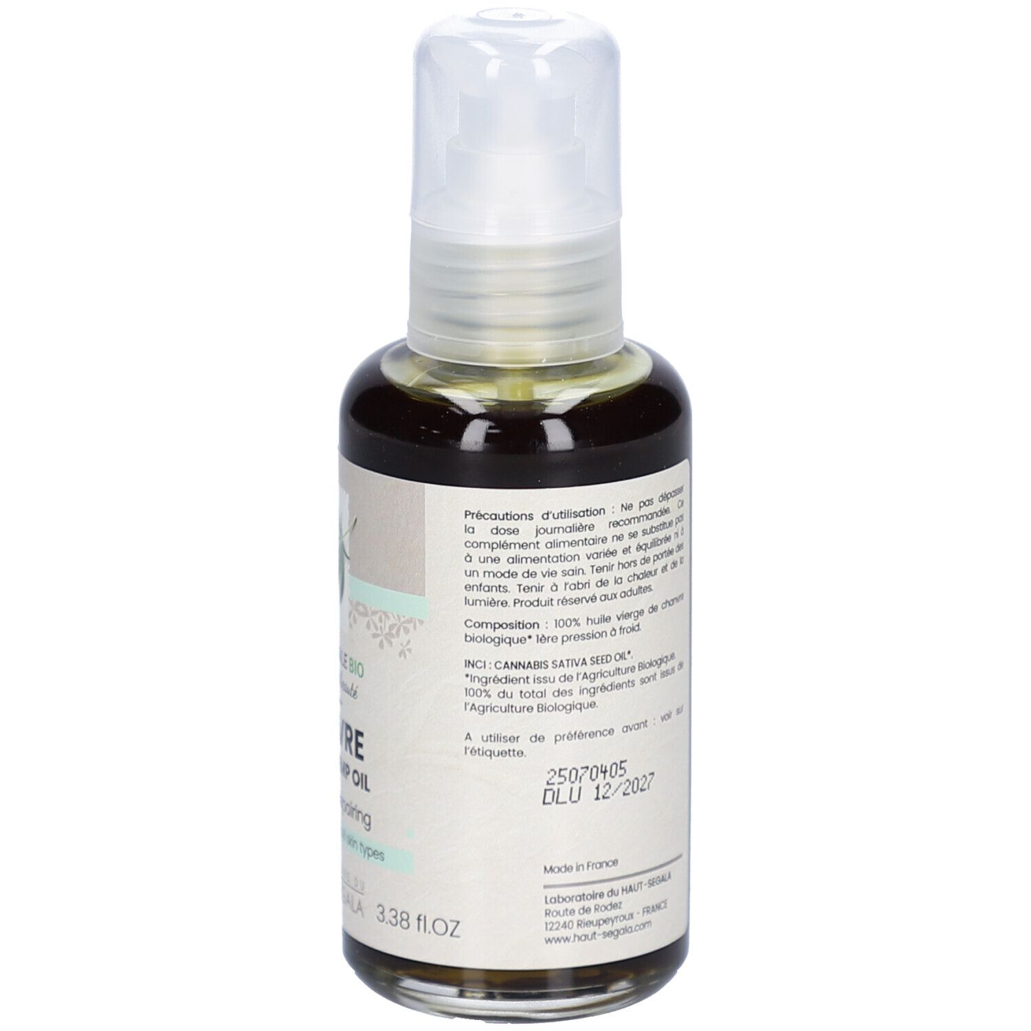 Achterkant van de bruine glazen fles met pomp. Etiket met tekst en biologische labels. Merk: HAUT-SEGALA.