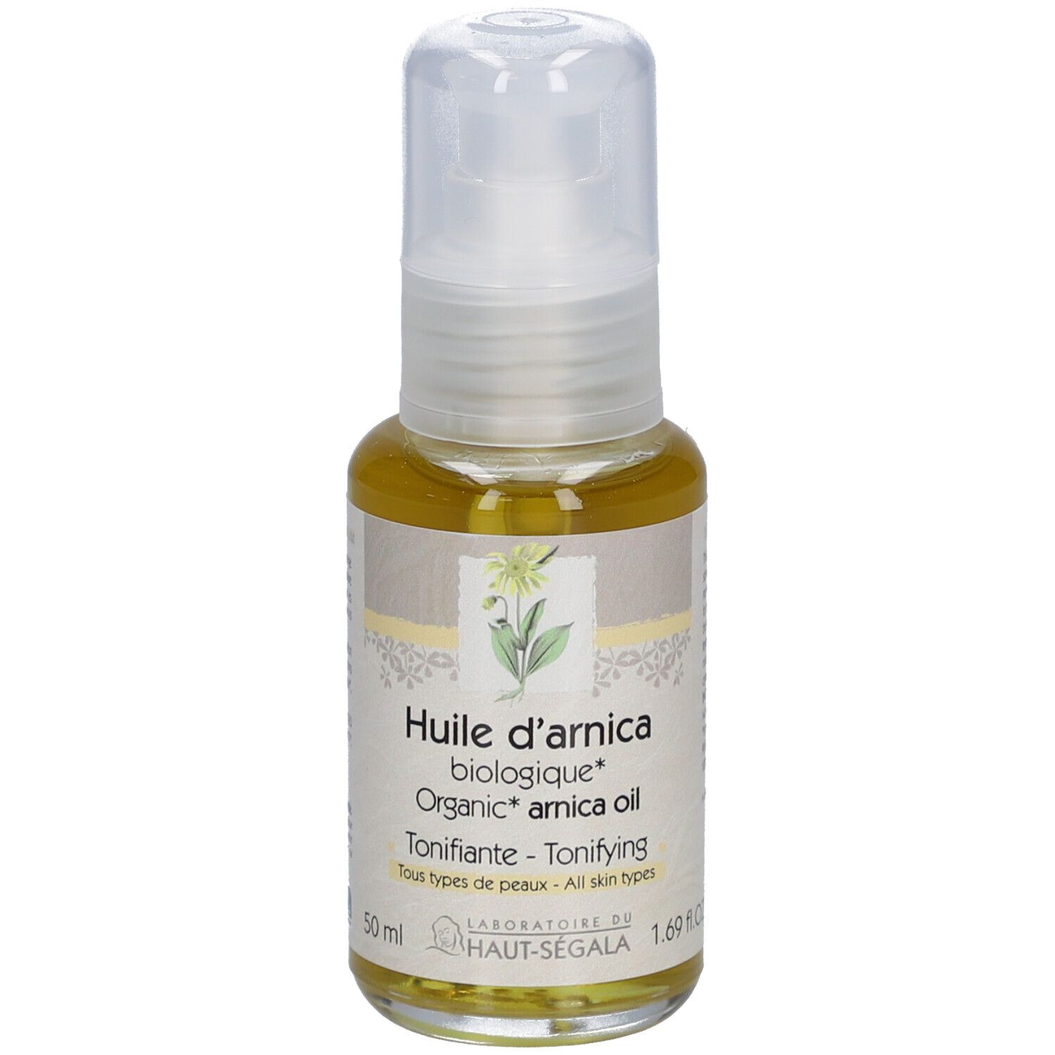 Arnica-oliefles. Gele olie in een glazen fles met verstuiver. Productinformatie op het etiket.