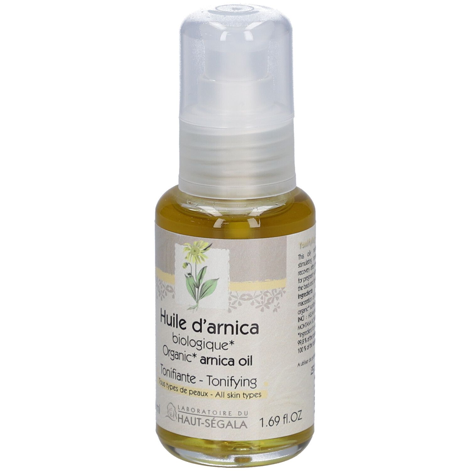 Arnica-oliefles. Gele olie in een glazen fles met verstuiver. Productinformatie op het etiket.
