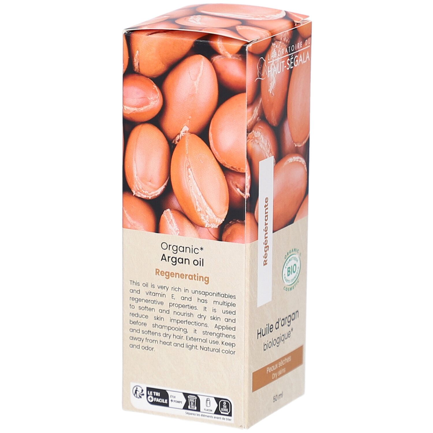Kartonnen verpakking met afbeelding van arganolie. Tekst: Organic Argan oil, Regenerating. Bio-label. Productbeschrijving.