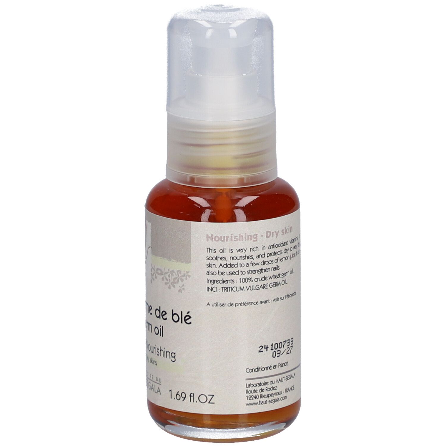 Fles tarwekiemolie met pomp. Opschrift: Huile de germe de blé, Wheat germ oil, Nourrissante, Peaux sèches. Laboratoire du Haut-Ségala.