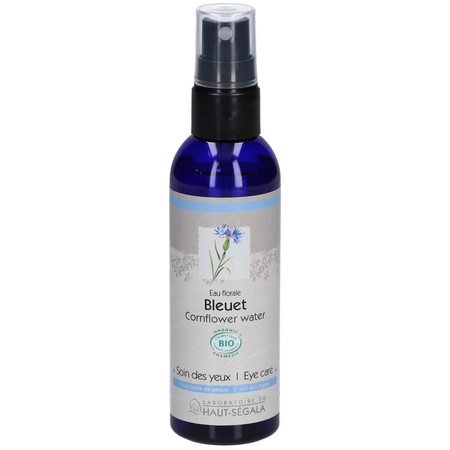 Blauwe fles met verstuiver. Opschrift: Eau florale Bleuet Cornflower water. Bio-certificering. Laboratoire du Haut-Ségala.