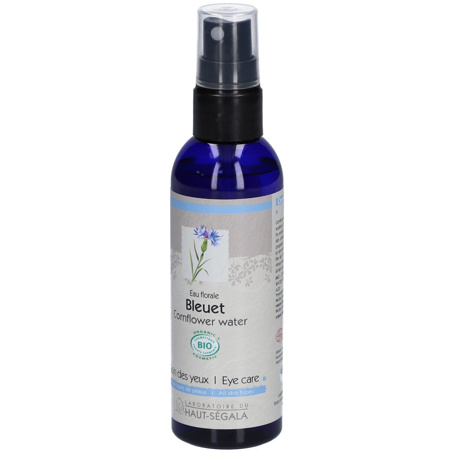 Blauwe fles met verstuiver. Opschrift: Eau florale Bleuet Cornflower water. Bio-certificering. Laboratoire du Haut-Ségala.