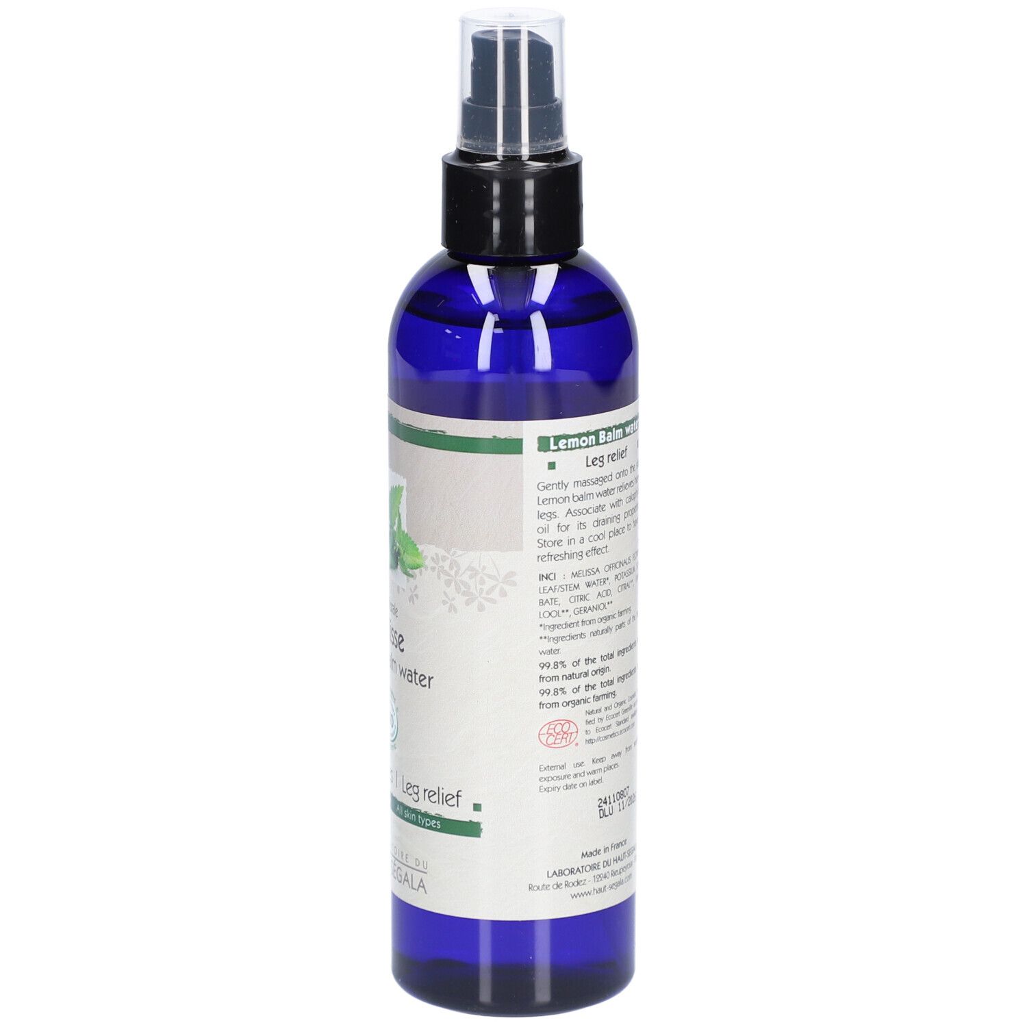 Blauwe spuitfles met etiket. Opschrift: Eau florale Mélisse, Lemon Balm water. Bio-certificering.