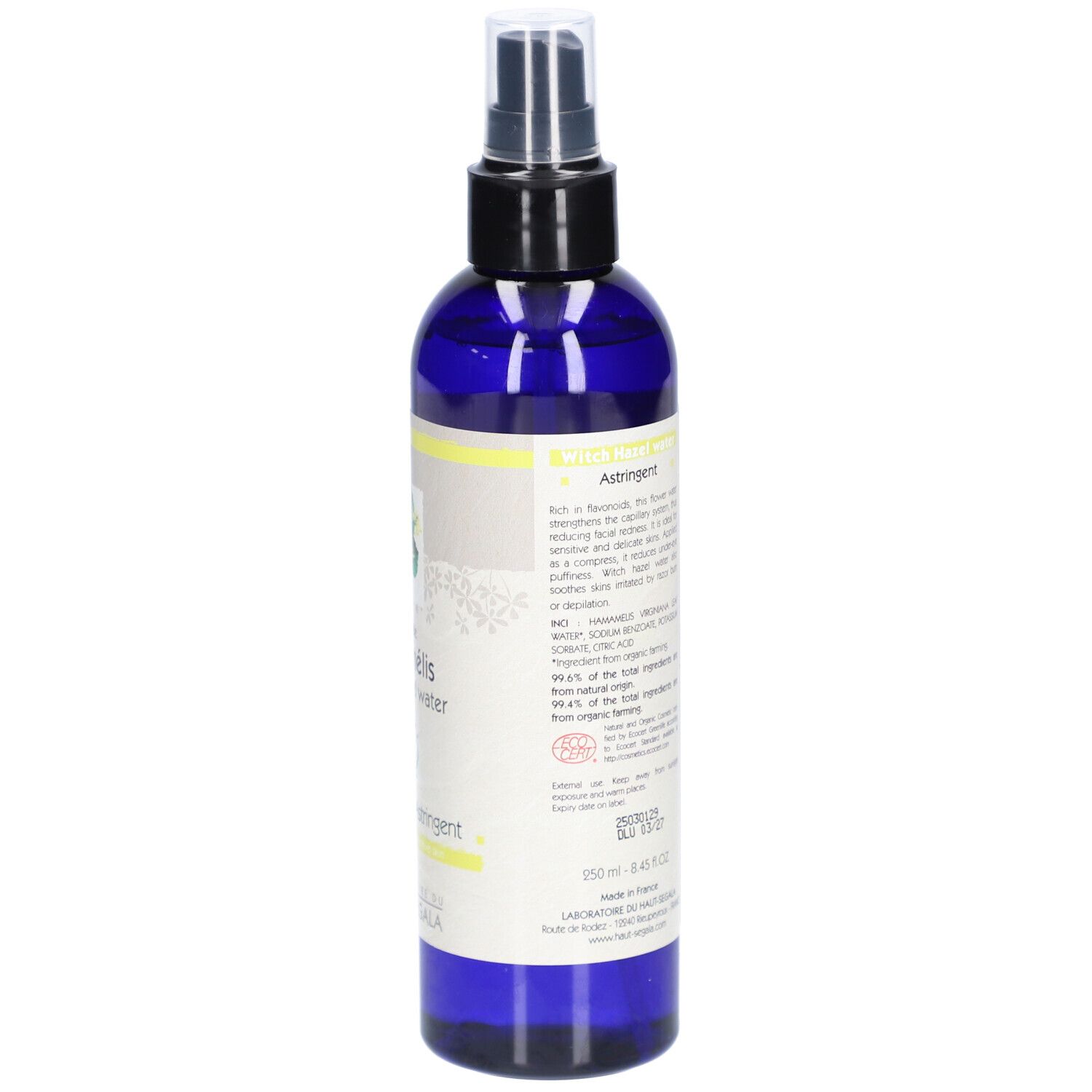 Blauwe fles met verstuiver. Achterkant met tekst en ingrediënten. Bio-certificering. Barcode.