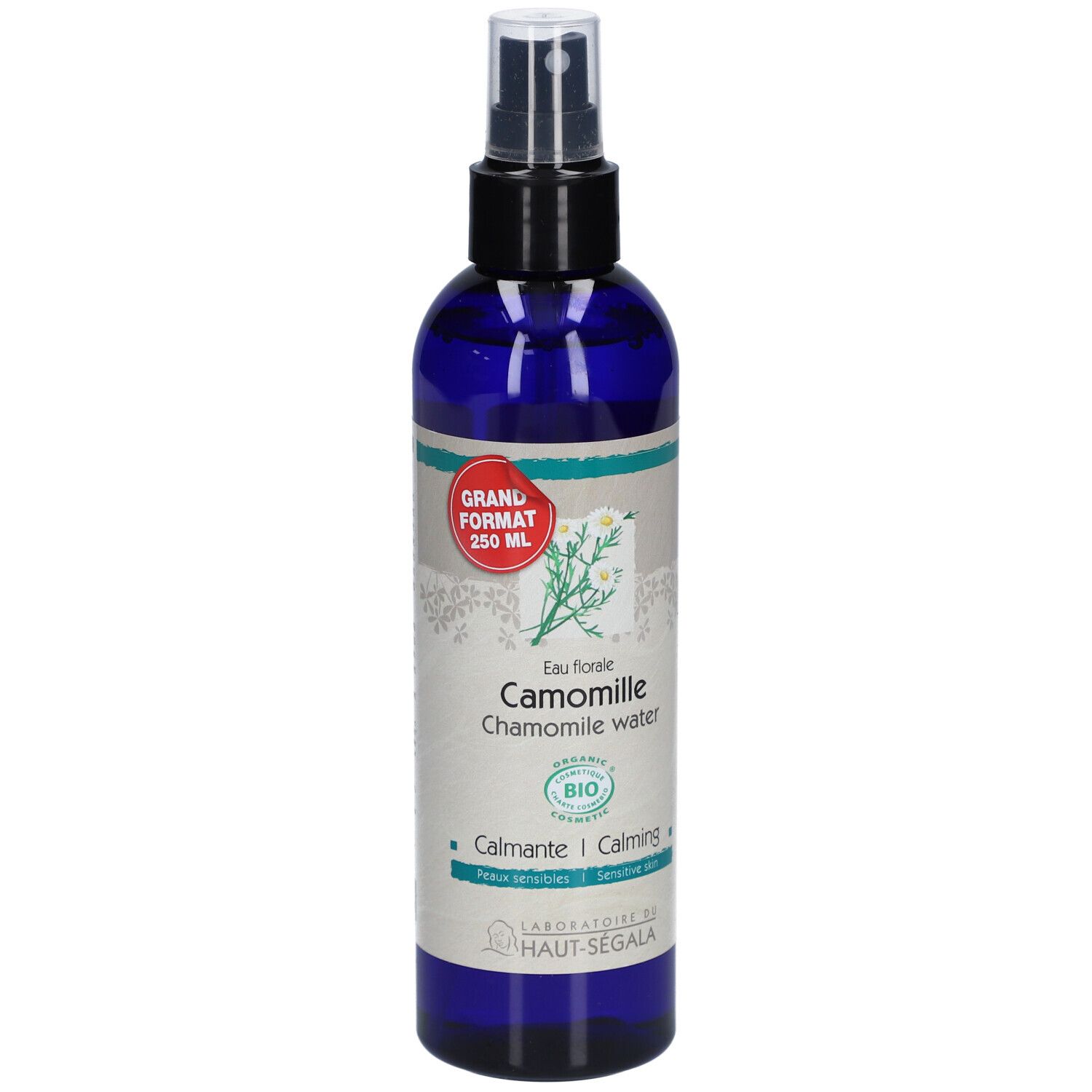 Flacon spray d'eau florale. Verre bleu, tête noire. Inscription: Camomille, certification Bio, 250 ml, Laboratoire du Haut-Segala.