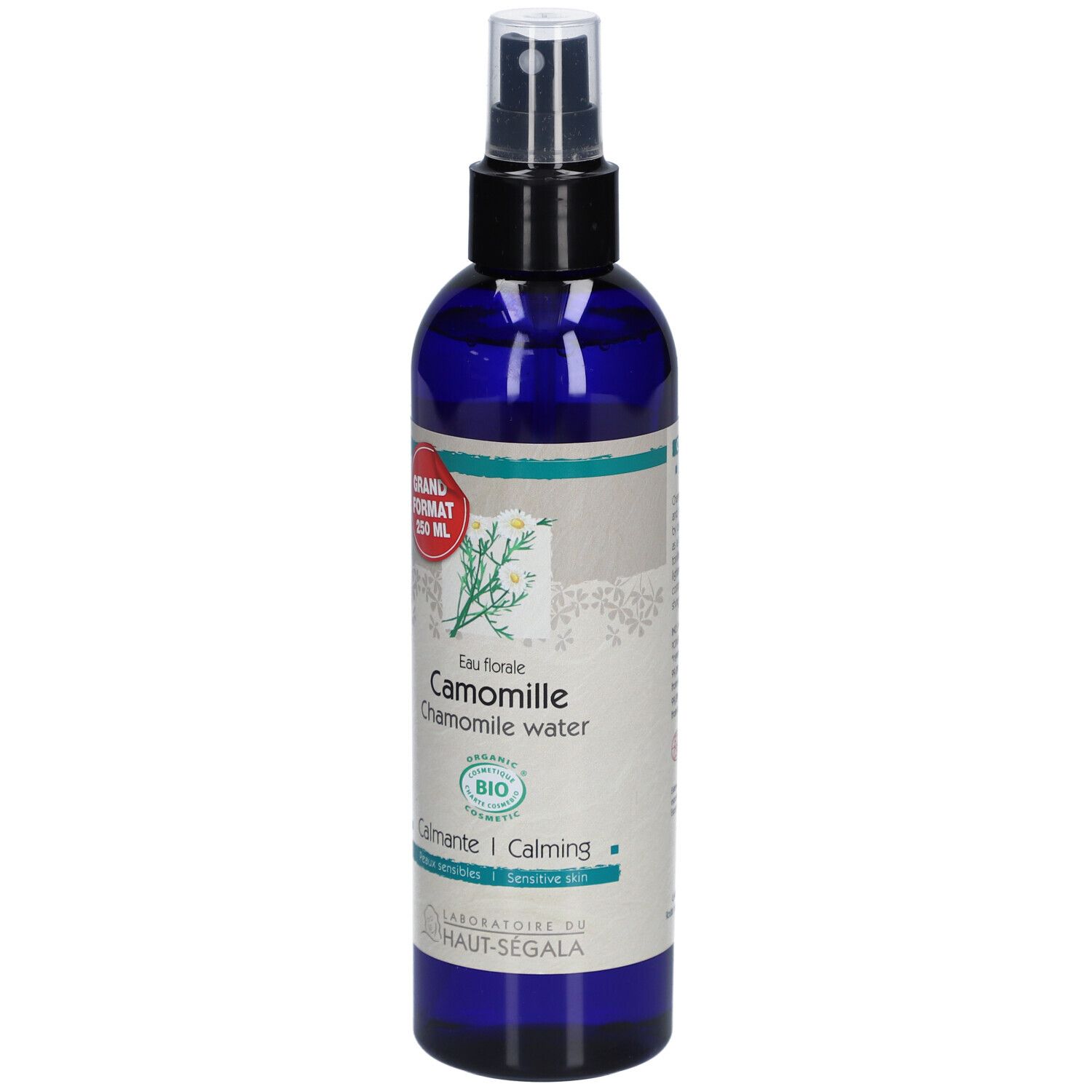 Flacon spray d'eau florale. Verre bleu, tête noire. Inscription: Camomille, certification Bio, 250 ml, Laboratoire du Haut-Segala.