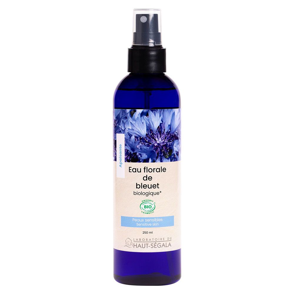 Flacon pulvérisateur bleu-violet. Inscription: Eau florale de bleuet biologique. Certification bio. Laboratoire du Haut-Ségala.