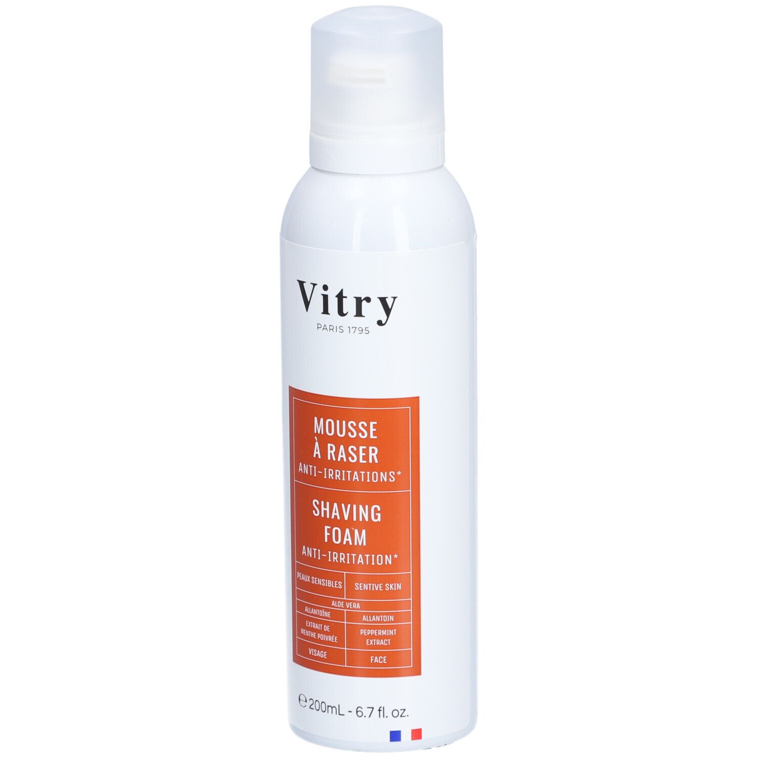 Flacon blanc avec étiquette orange. Texte: Vitry, Mousse à raser anti-irritations, Shaving Foam. Pour peaux sensibles.