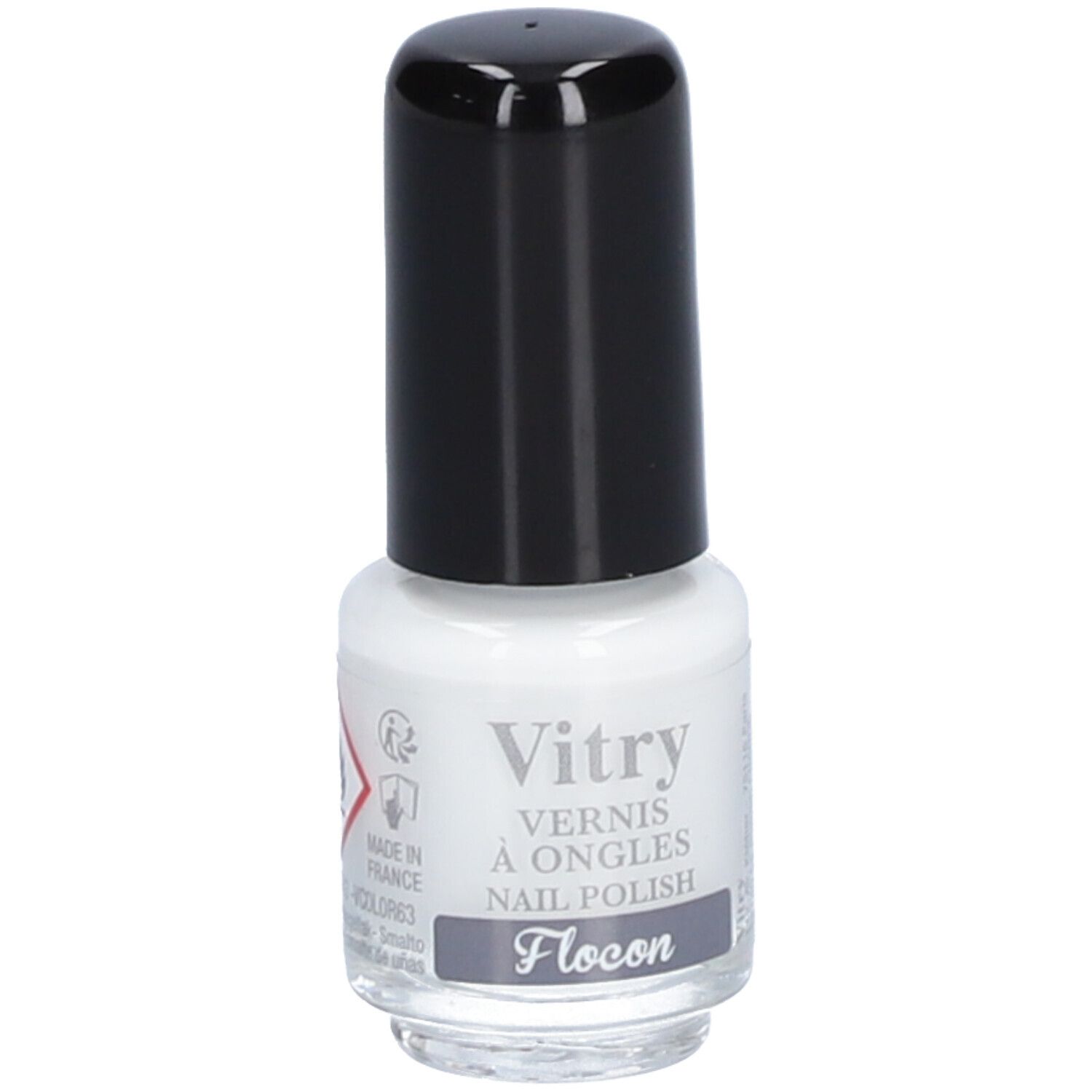 Witte nagellakfles met zwarte dop. Opschrift: Vitry, Vernis à Ongles, Nail Polish, Flocon.