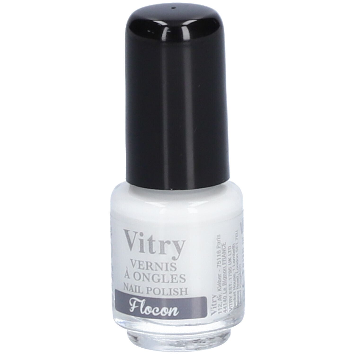Witte nagellakfles met zwarte dop. Opschrift: Vitry, Vernis à Ongles, Nail Polish, Flocon, adresgegevens.