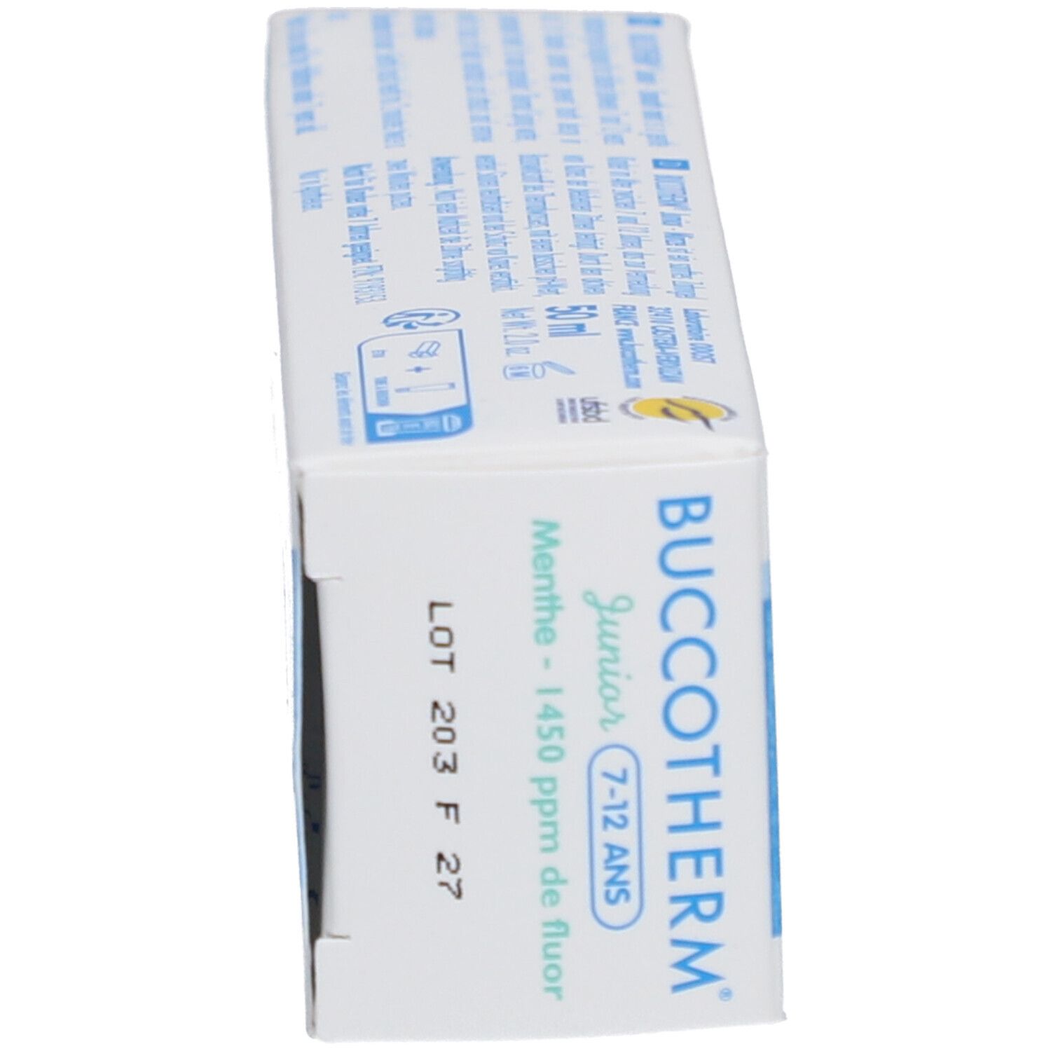 Côté de la boîte de dentifrice. Numéro de lot et date de péremption. BUCCOTHERM Junior.