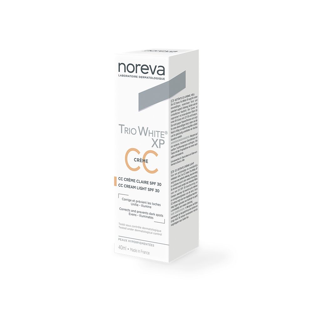 Boîte blanche. Marque Noreva. Texte: Trio White XP CC Crème Claire SPF 30. Inscription en français et anglais. 40ml.