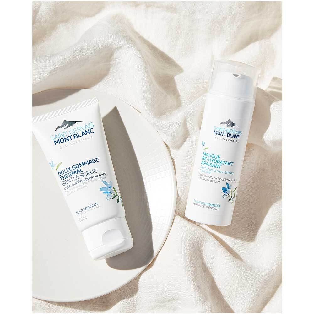 Deux produits sur une assiette. À gauche: tube de gommage. À droite: flacon de masque. Logo SAINT-GERVAIS visible.