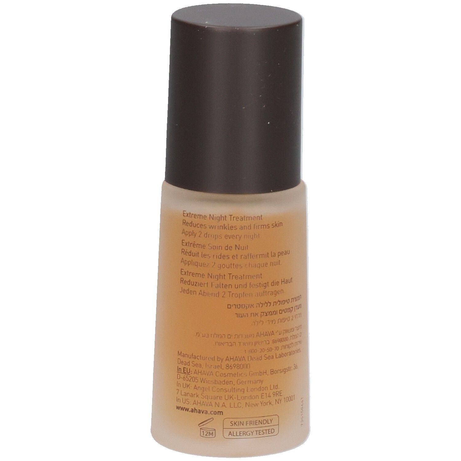 Bruine fles met bruine dop. Opschrift AHAVA, TIME TO REVITALIZE, EXTREME NIGHT TREATMENT. Tekst op achterkant.