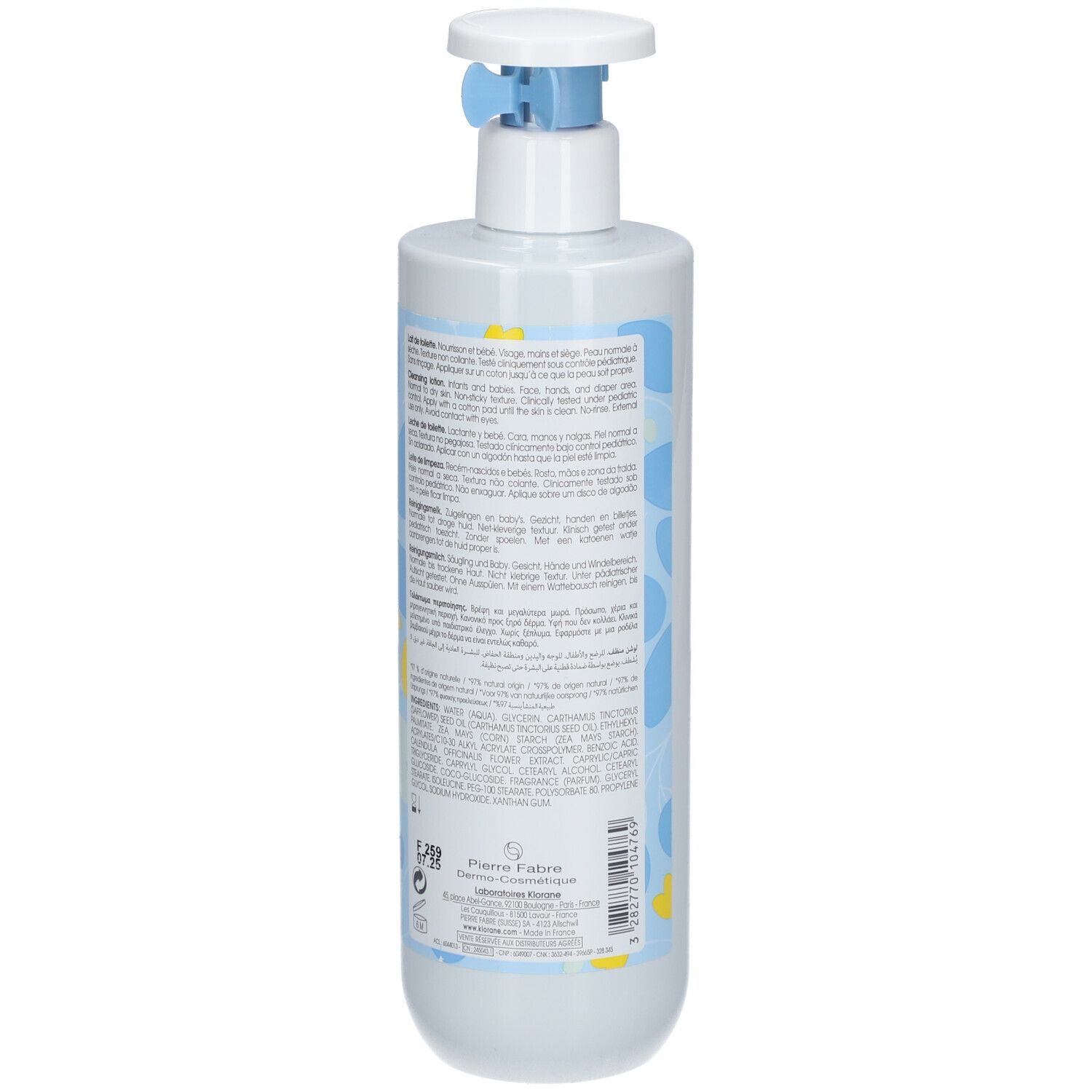 Achterkant van de Klorane Bébé Toiletmelk fles. Tekst in meerdere talen. Blauwe en gele decoraties.