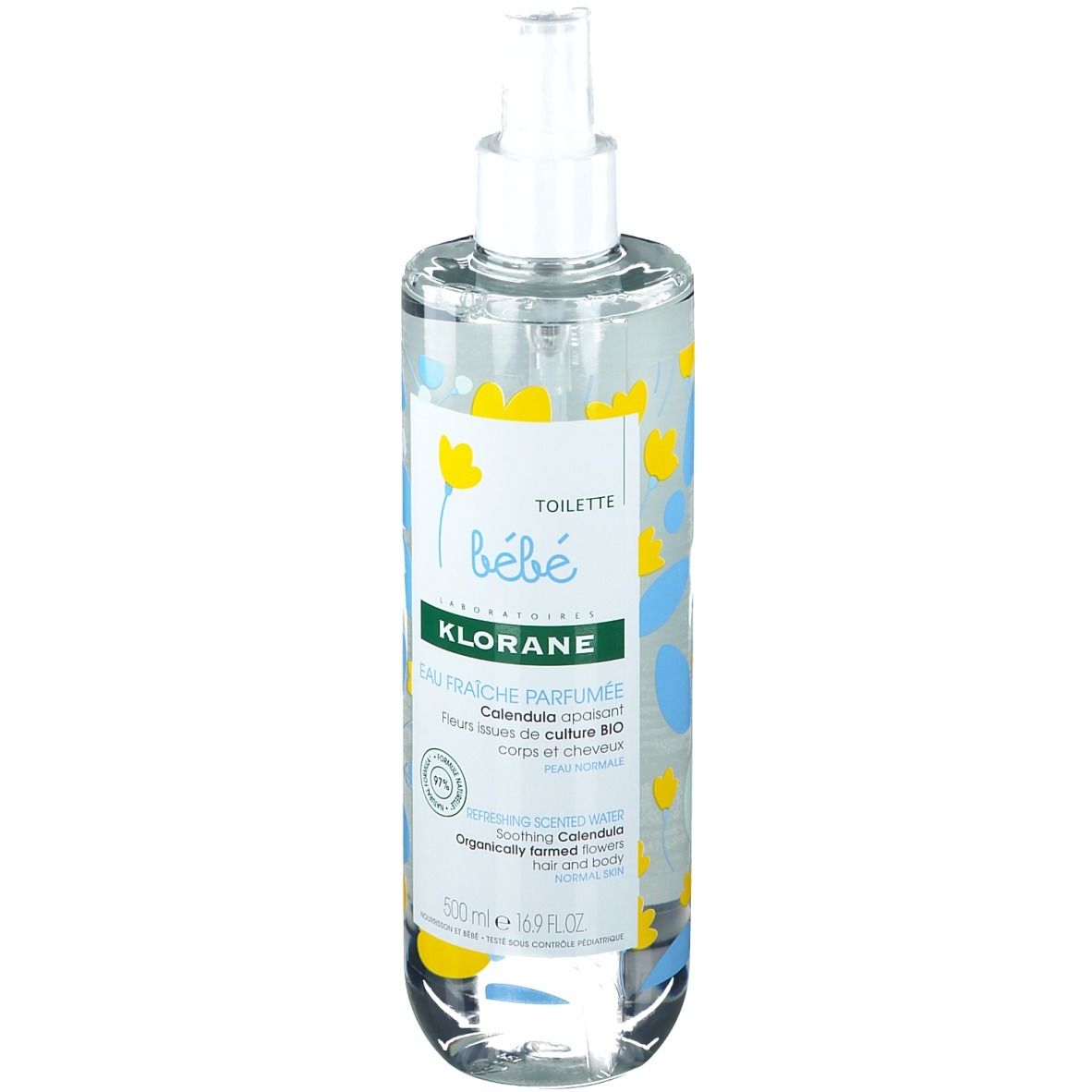 Flacon transparent Klorane Bébé Eau Fraîche Parfumée avec vaporisateur. Motifs floraux jaunes et bleus.