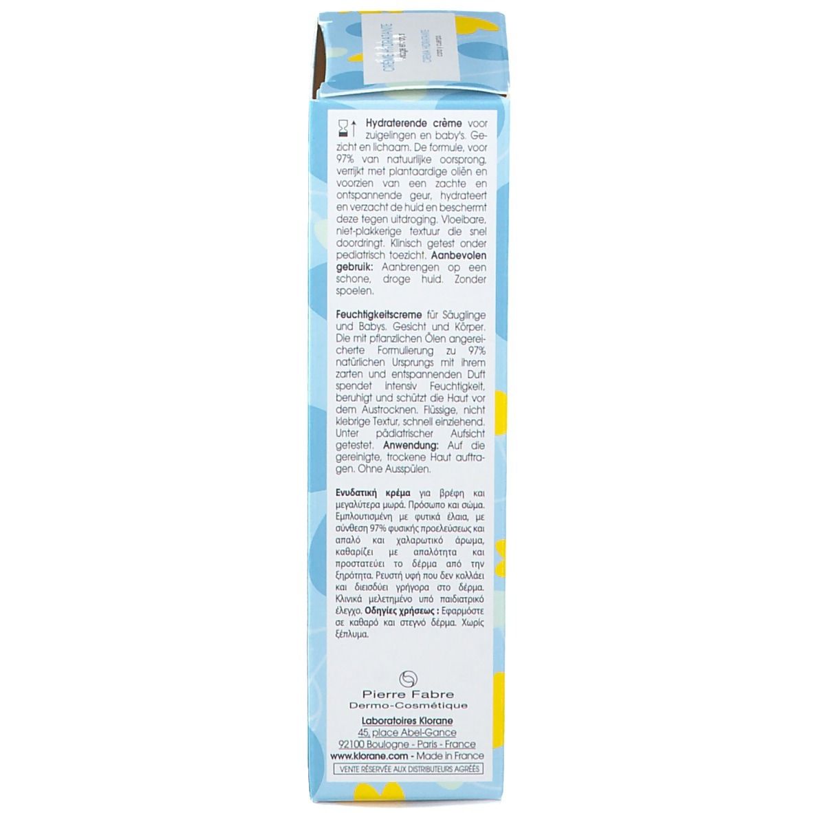 Achterkant van de productverpakking. Meertalige tekst: gebruik, ingrediënten. Bloemmotief.