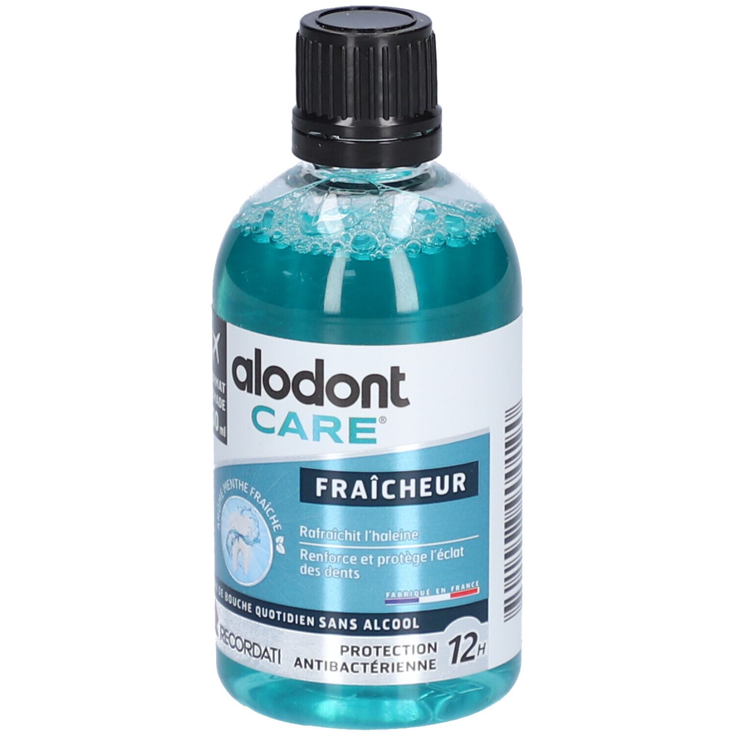 Transparante fles met blauwe vloeistof en zwarte dop. Opschrift: alodont CARE Fraîcheur. 100 ml.