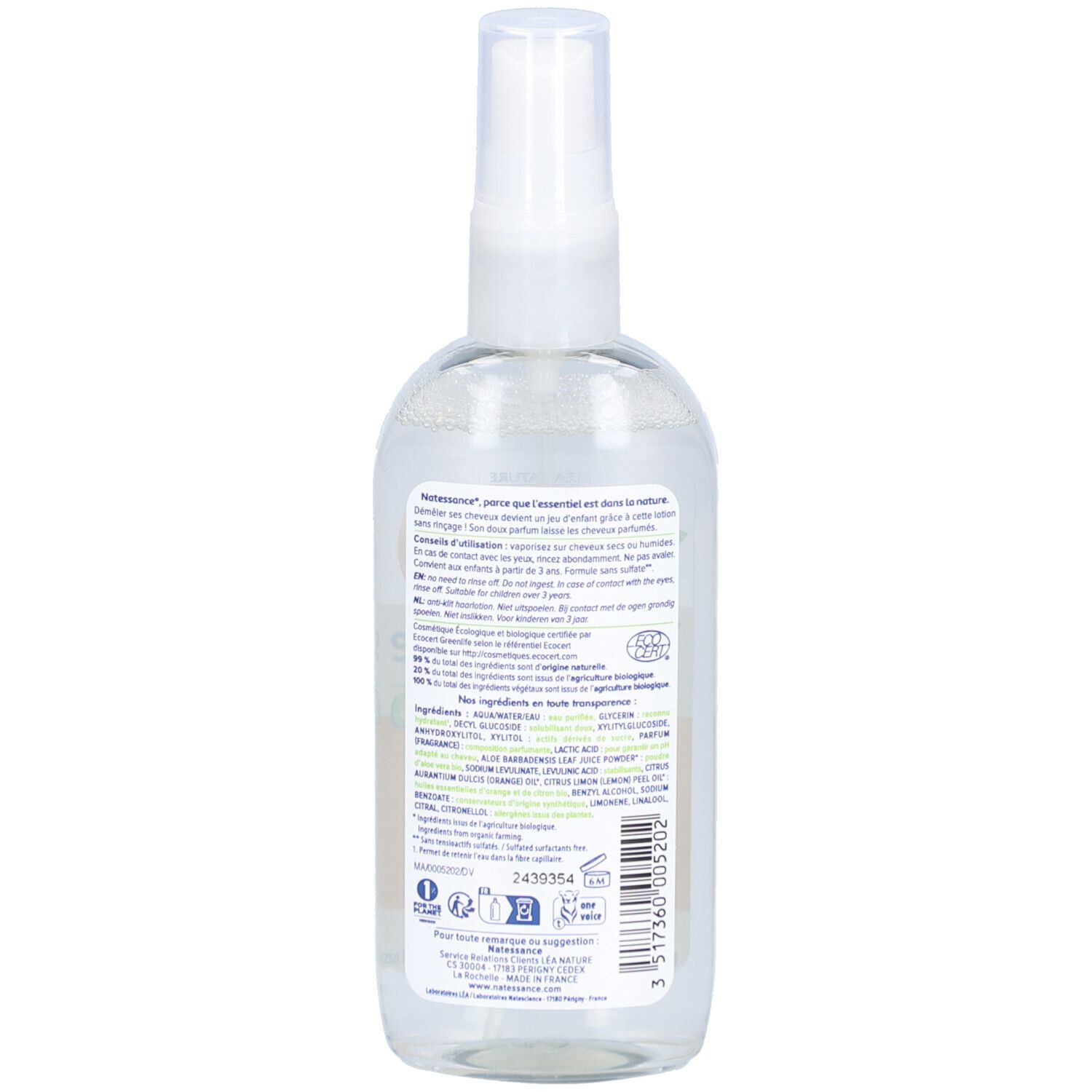 Achterkant van de fles. Tekst met ingrediënten en instructies. Biologische certificering. Transparante vloeistof zichtbaar.