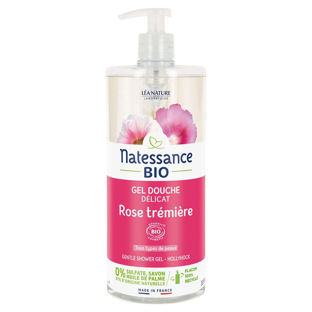 Transparante fles met doseerpomp. Etiket met productnaam, bio-label en informatie. Roze en witte bloemen.