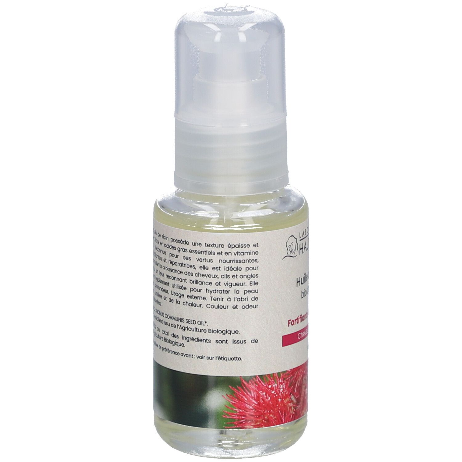 Flacon d'huile avec vaporisateur. Inscription: Huile de ricin biologique, Fortifiante et réparatrice, 50 ml. Texte sur l'étiquette.