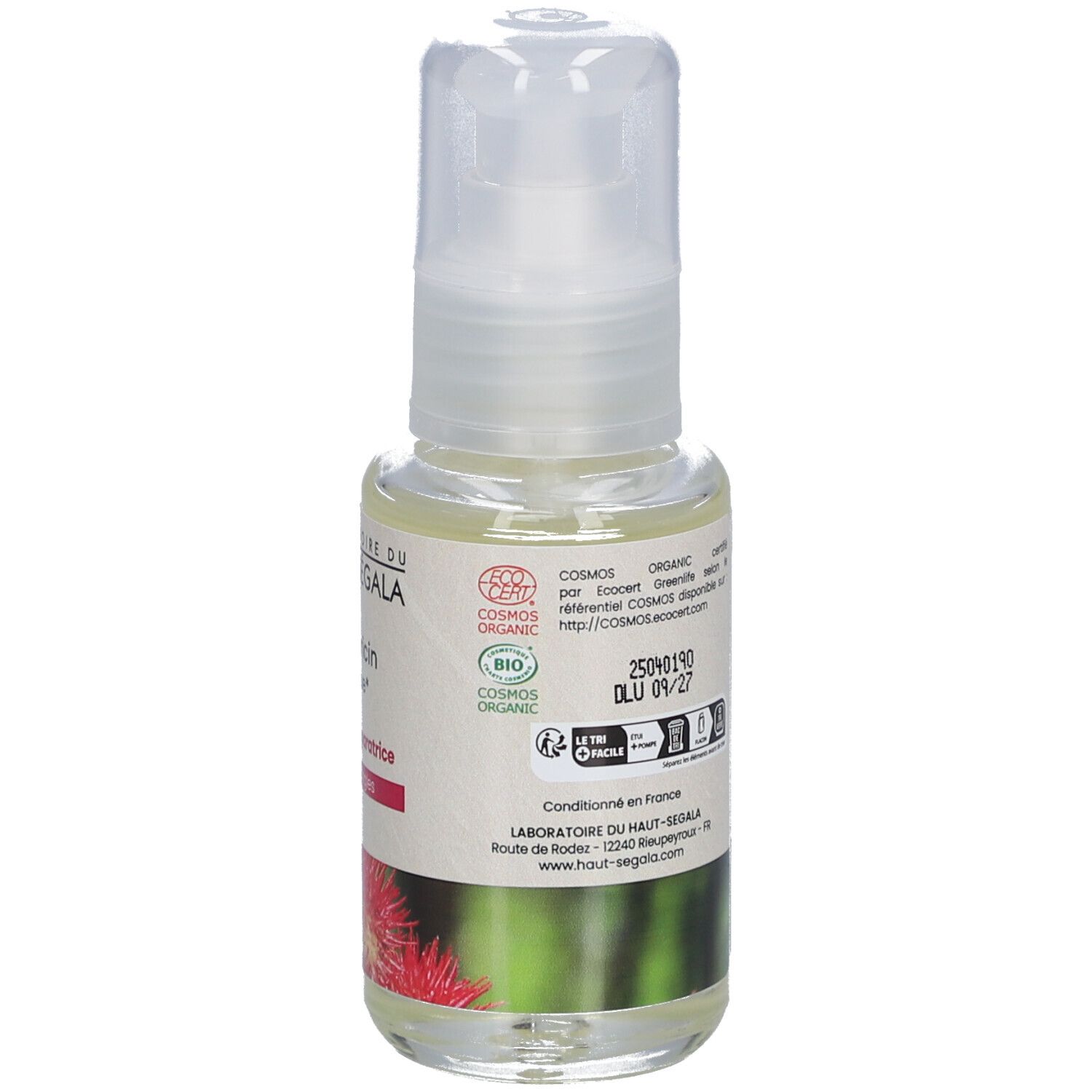 Flacon d'huile avec vaporisateur. Inscription: Huile de ricin biologique, Fortifiante et réparatrice, 50 ml. Texte sur l'étiquette.