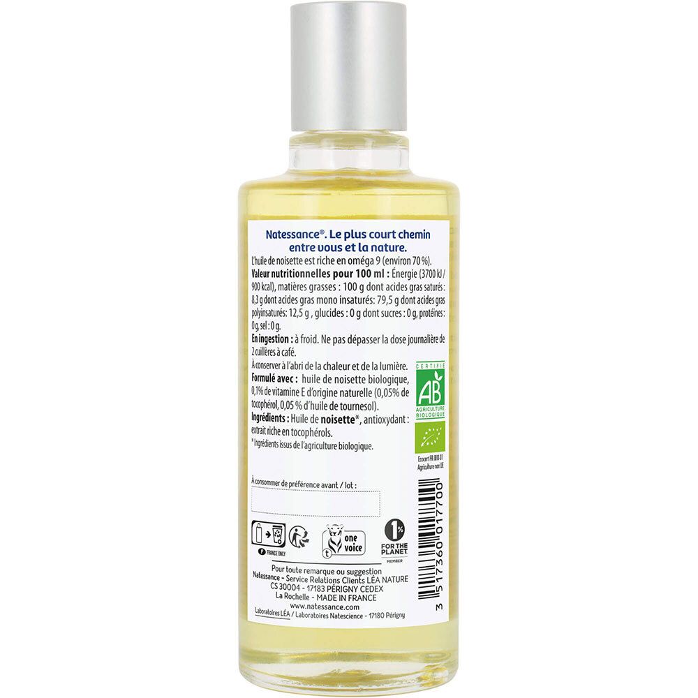 Achterkant van een glazen fles. Bevat voedingswaarde, ingrediënten en bio-certificering. Met AB-keurmerk.