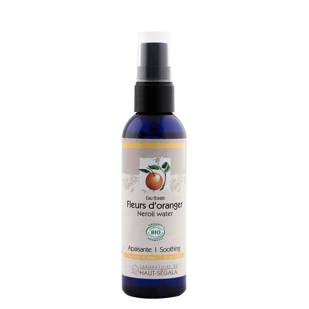 Blauwe fles met verstuiver. Opschrift: Fleurs d'oranger, Neroli water. Bio-certificering.