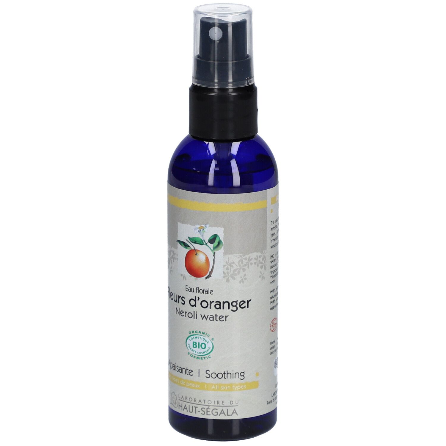 Blauwe fles met verstuiver. Opschrift: Fleurs d'oranger, Neroli water. Bio-certificering.