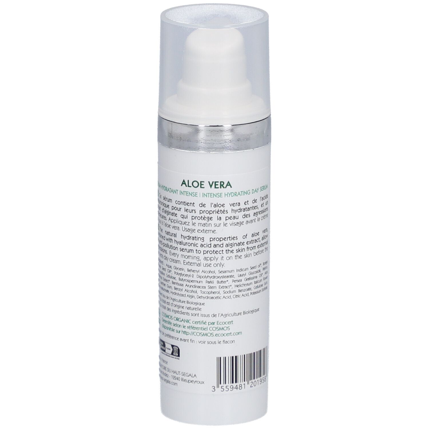 Wit-groene fles met pomp. Opschrift: Aloe Vera Serum, 99,1% ingrediënten van natuurlijke oorsprong. Bio-certificering.