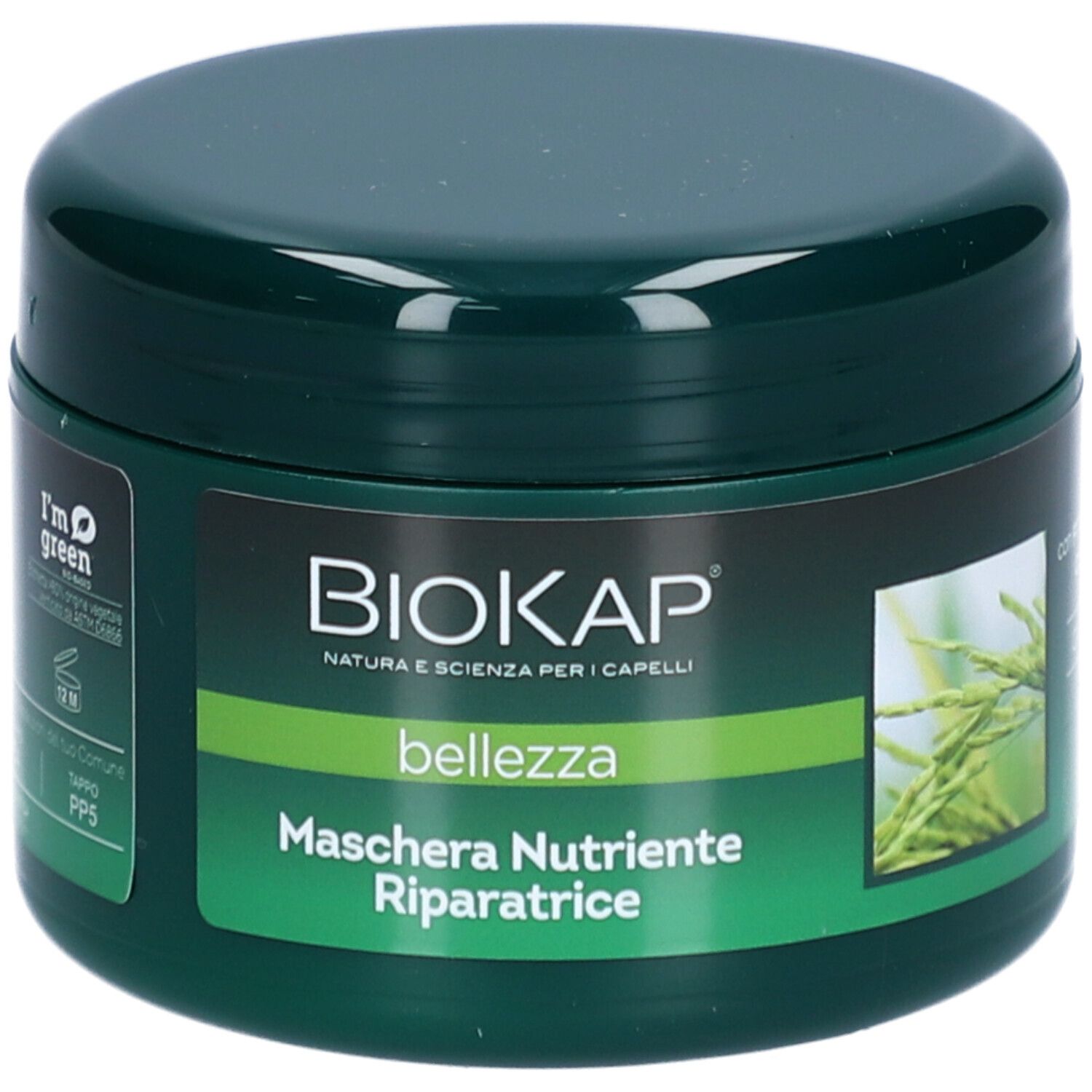 Groene pot met BIOKAP-logo en tekst. Opschrift: Maschera Nutriente Riparatrice. Bevat haarmasker. Groen met gele accenten.