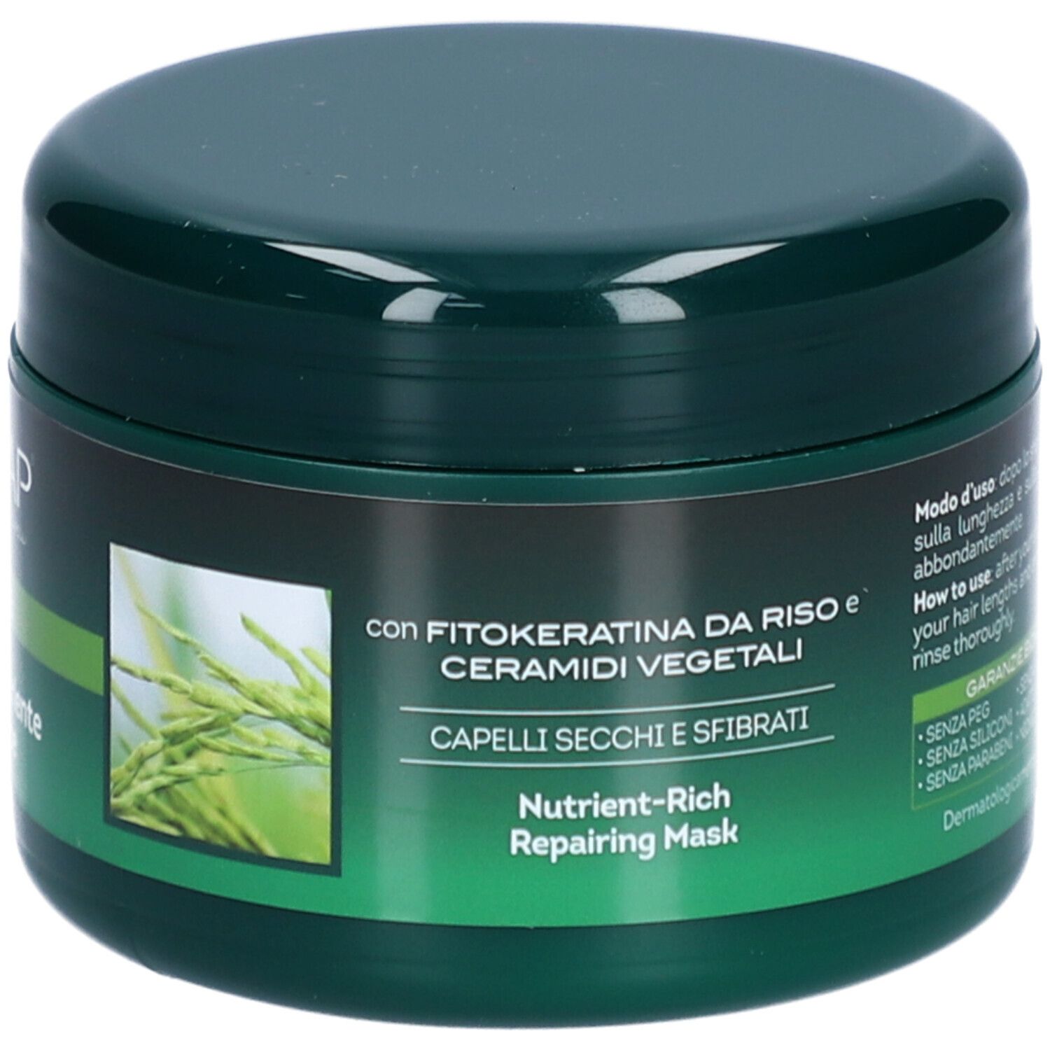 Groene pot met tekst. Opschrift: BIOKAP. Bevat haarmasker. Tekst: con Fitokeratina da Riso e Ceramidi vegetali.