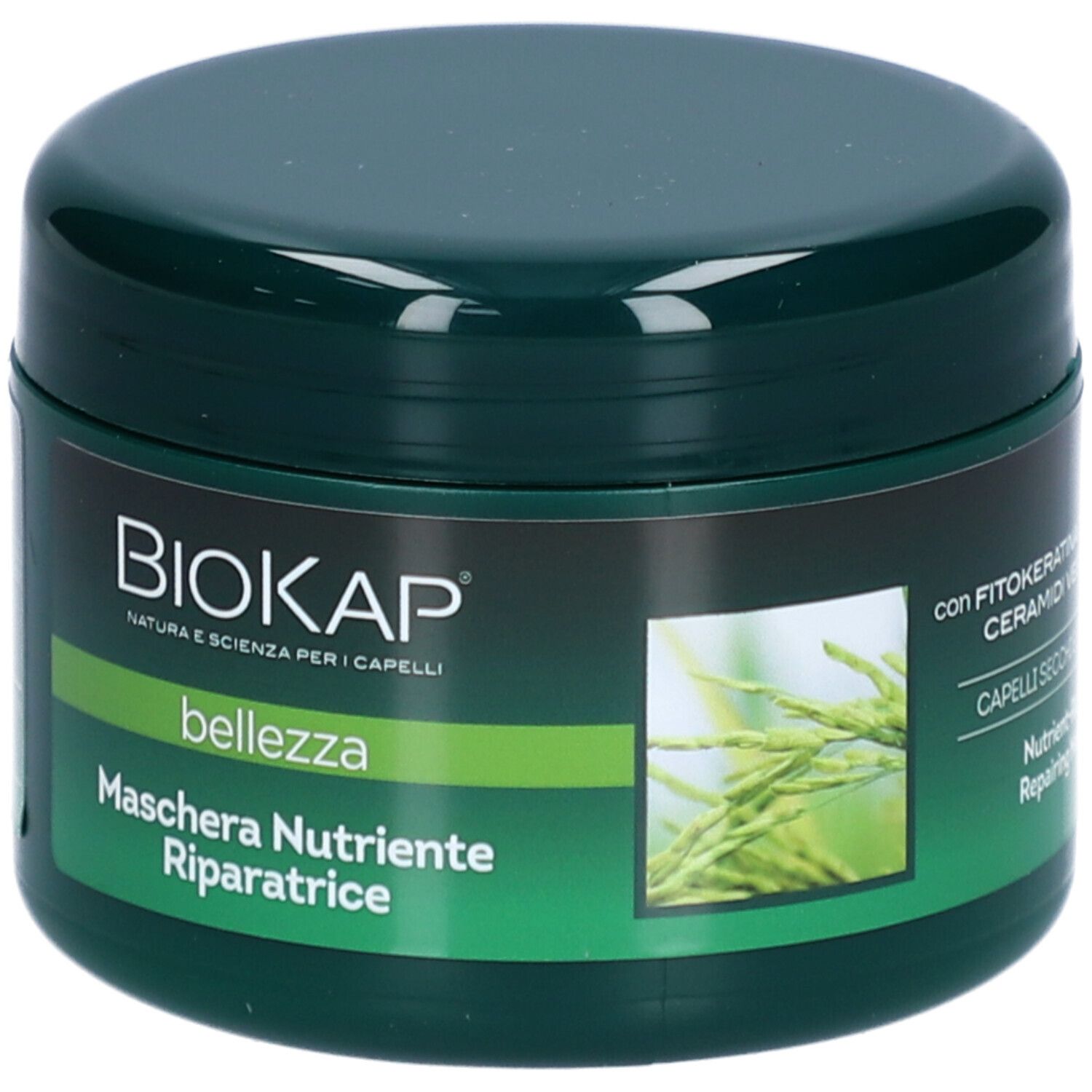 Groene pot met BIOKAP-logo en tekst. Opschrift: Maschera Nutriente Riparatrice. Bevat haarmasker. Groen met gele accenten.
