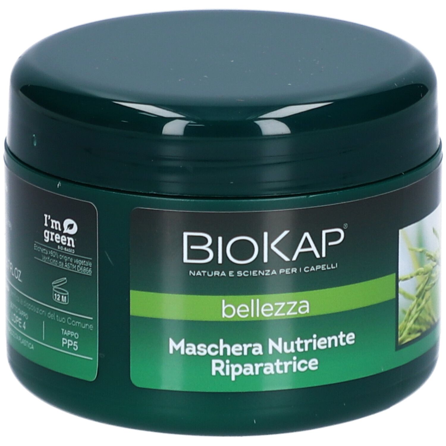 Groene pot met BIOKAP-logo en tekst. Opschrift: Maschera Nutriente Riparatrice. Bevat haarmasker. Groen met gele accenten.