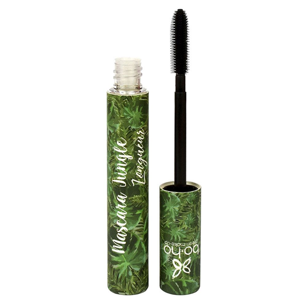 Tube de mascara et brosse. Emballage vert imprimé avec nom du produit. Brosse noire.