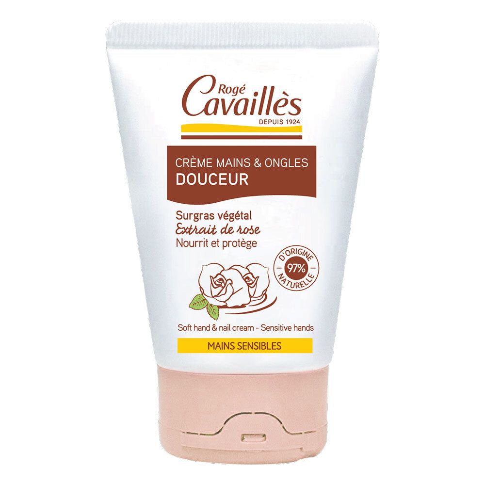 Tube de crème pour les mains Rogé Cavaillès. Inscription : Crème Mains & Ongles Douceur, 97% d'origine naturelle. Fond blanc, accents marron et rose.