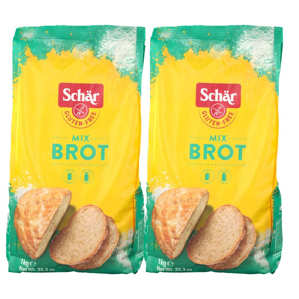 Twee verpakkingen Schär Mix Brood. Opschrift: Glutenvrij. Getoonde sneetjes brood. 1 kg verpakking.