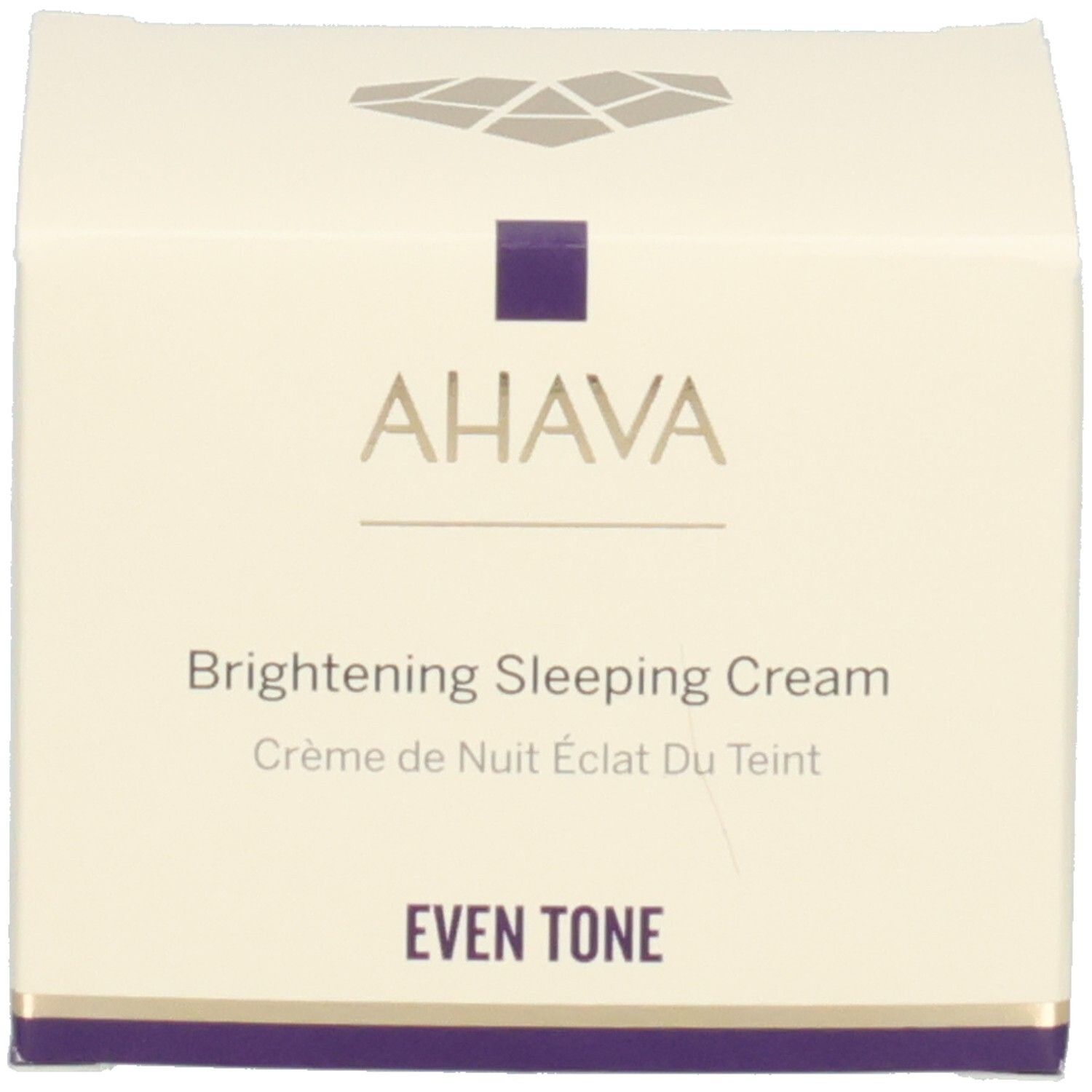 Doos met opschrift AHAVA, Brightening Sleeping Cream. Wit met paarse accenten.