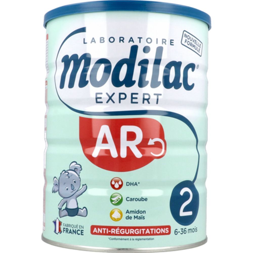 Modilac Expert 2 AR-blik. Lichtgroen blik met blauw deksel. Bevat babyvoeding. Opschrift: Modilac Expert AR, 6-36 maanden.