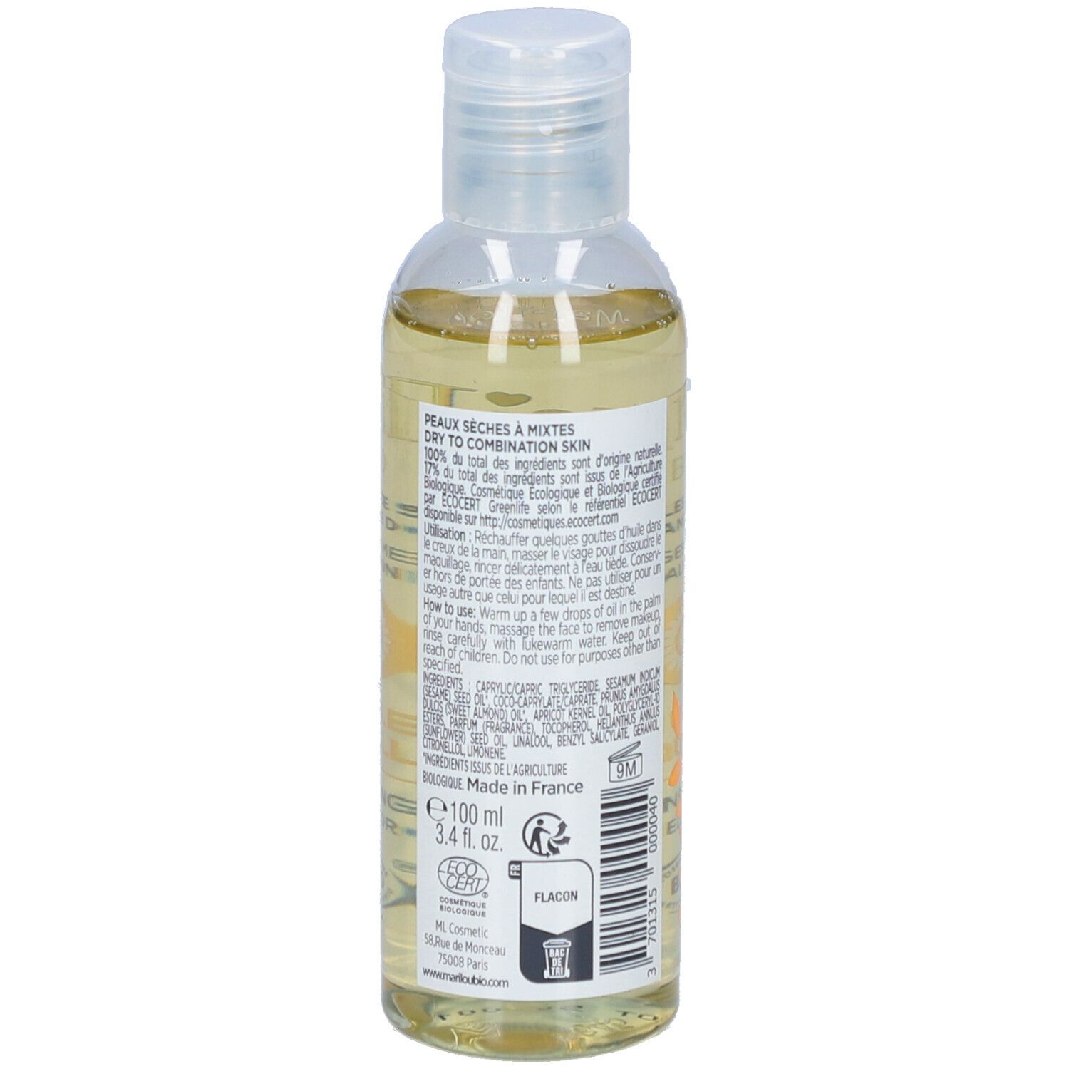 Transparante fles met gele olie. Opschrift: Marilou Bio, Huile Démaquillante. Ingrediënten en tekst achterkant.