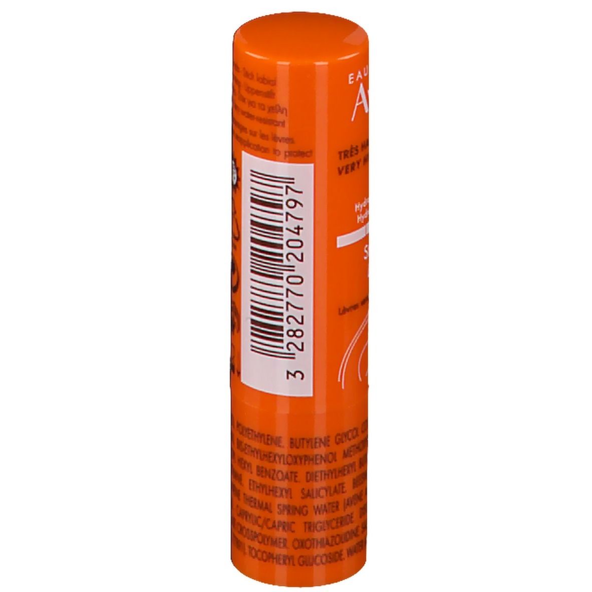 Achterkant van een oranje lippenbalsem. Tekst en barcode. Detailweergave.