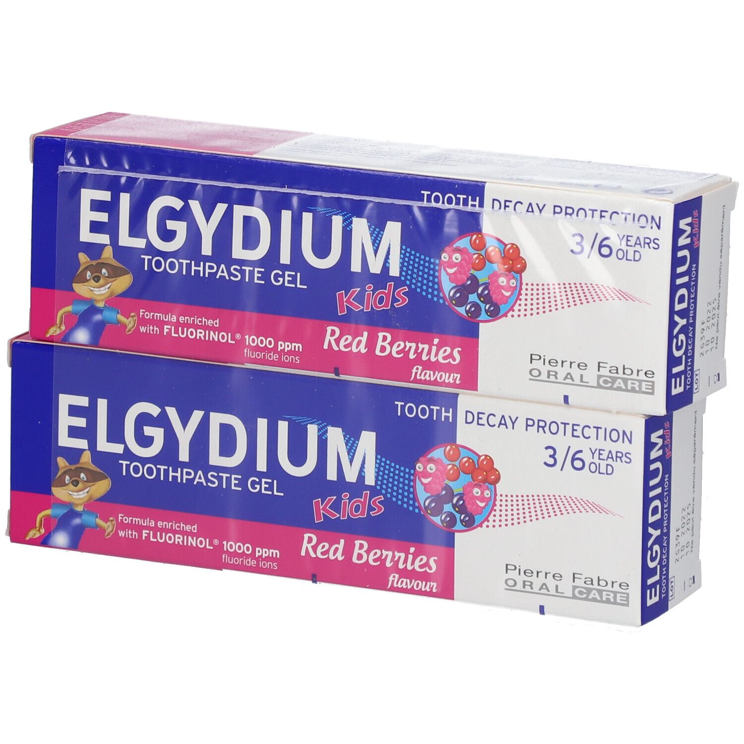 Twee tandpastadozen. Blauwe en roze verpakking. Tekst: ELGYDIUM Kids, Red Berries, 3/6 jaar.