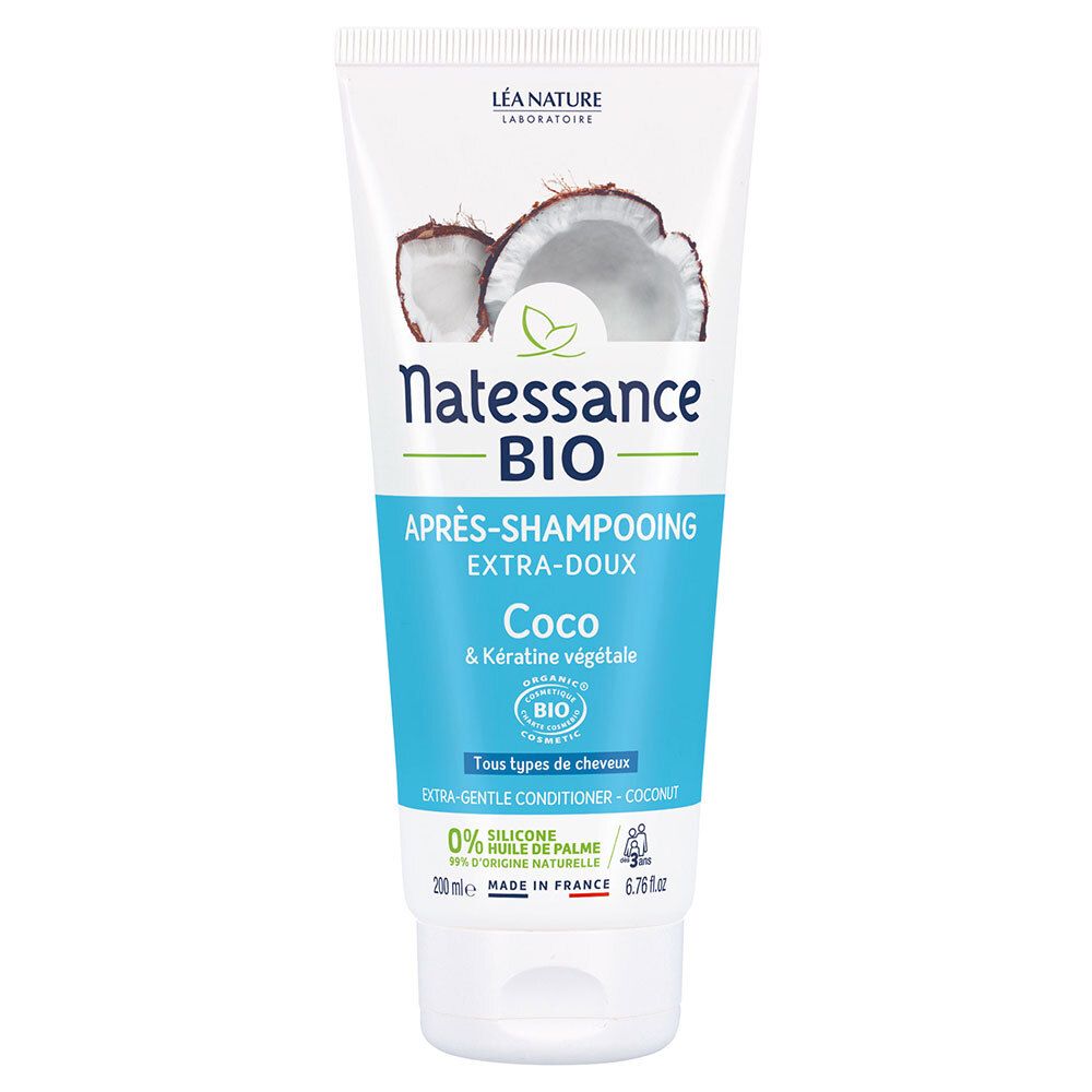 Tube blanc et bleu avec illustration de noix de coco. Texte: Natessance BIO, Après-shampooing Extra-Doux Coco & Kératine végétale.