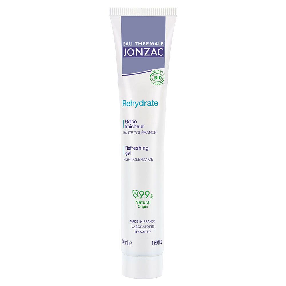 Tube blanc avec bouchon violet. Inscription et logo bio visibles. 99% d'origine naturelle.