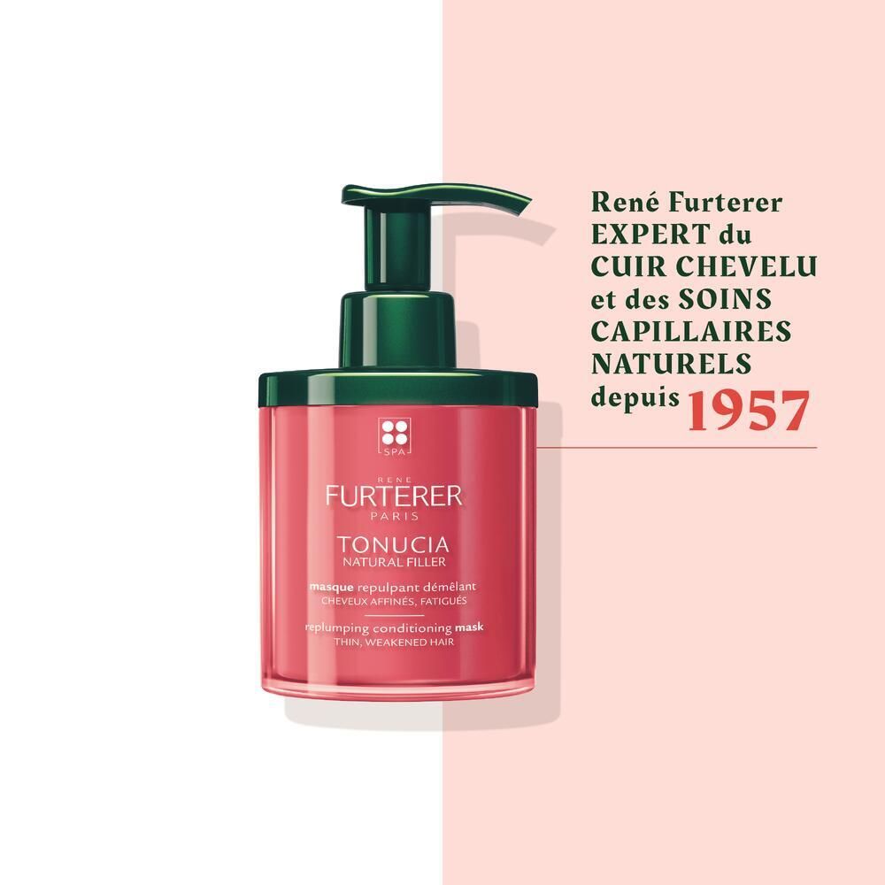 Flacon rouge avec pompe verte. Inscription: RENE FURTERER PARIS. Expert du cuir chevelu et des soins capillaires naturels.