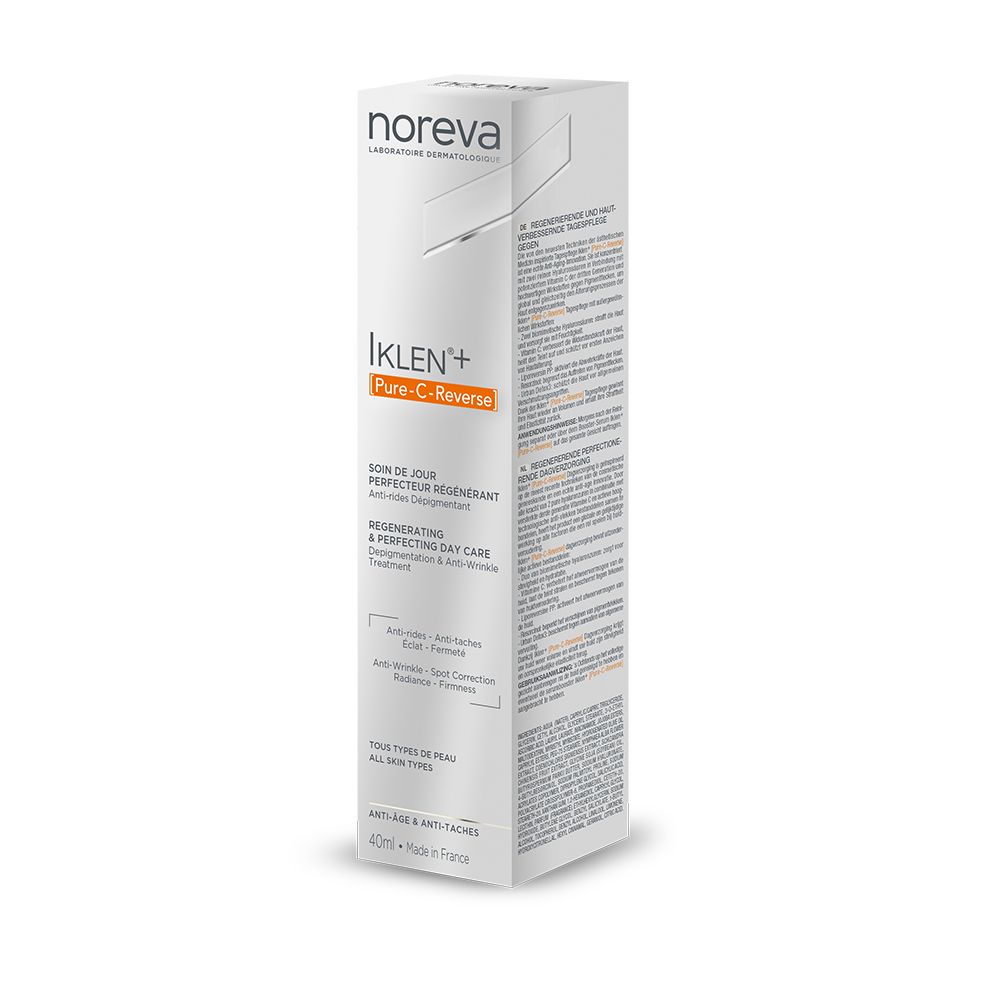 Witte doos met productinformatie. Opschrift: noreva, Iklen+ [Pure-C-Reverse], Regenererende dagverzorging.