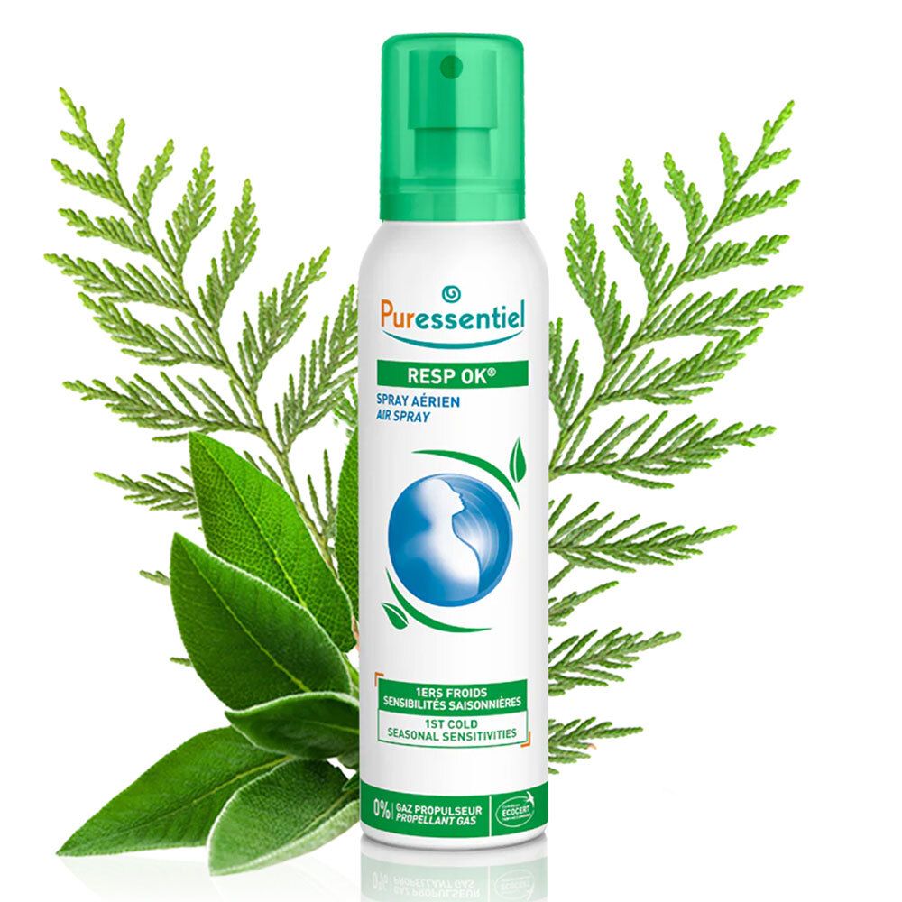 Spray Resp'OK® PURESSENTIEL, flacon. Vert et blanc, logo et texte, entouré de feuilles.