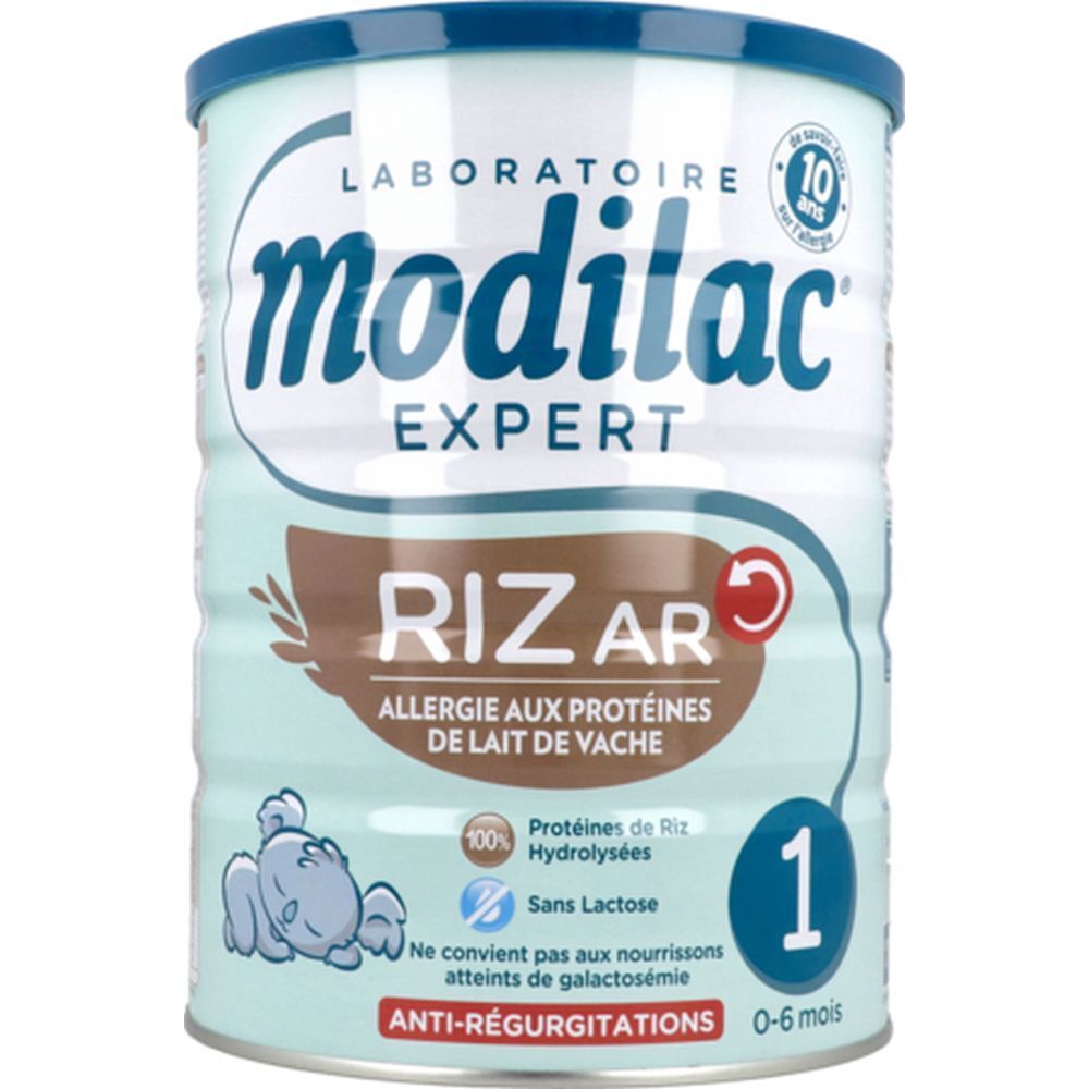 Modilac Expert 1 Riz AR-blik, 0-6 maanden. Opschrift: Allergie aux protéines de lait de vache. Blik met blauw deksel.