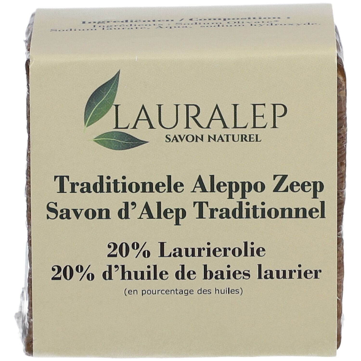 Blokzeep in verpakking. Opschrift: LAURALEP, Traditionele Aleppo Zeep, 20% laurierolie.